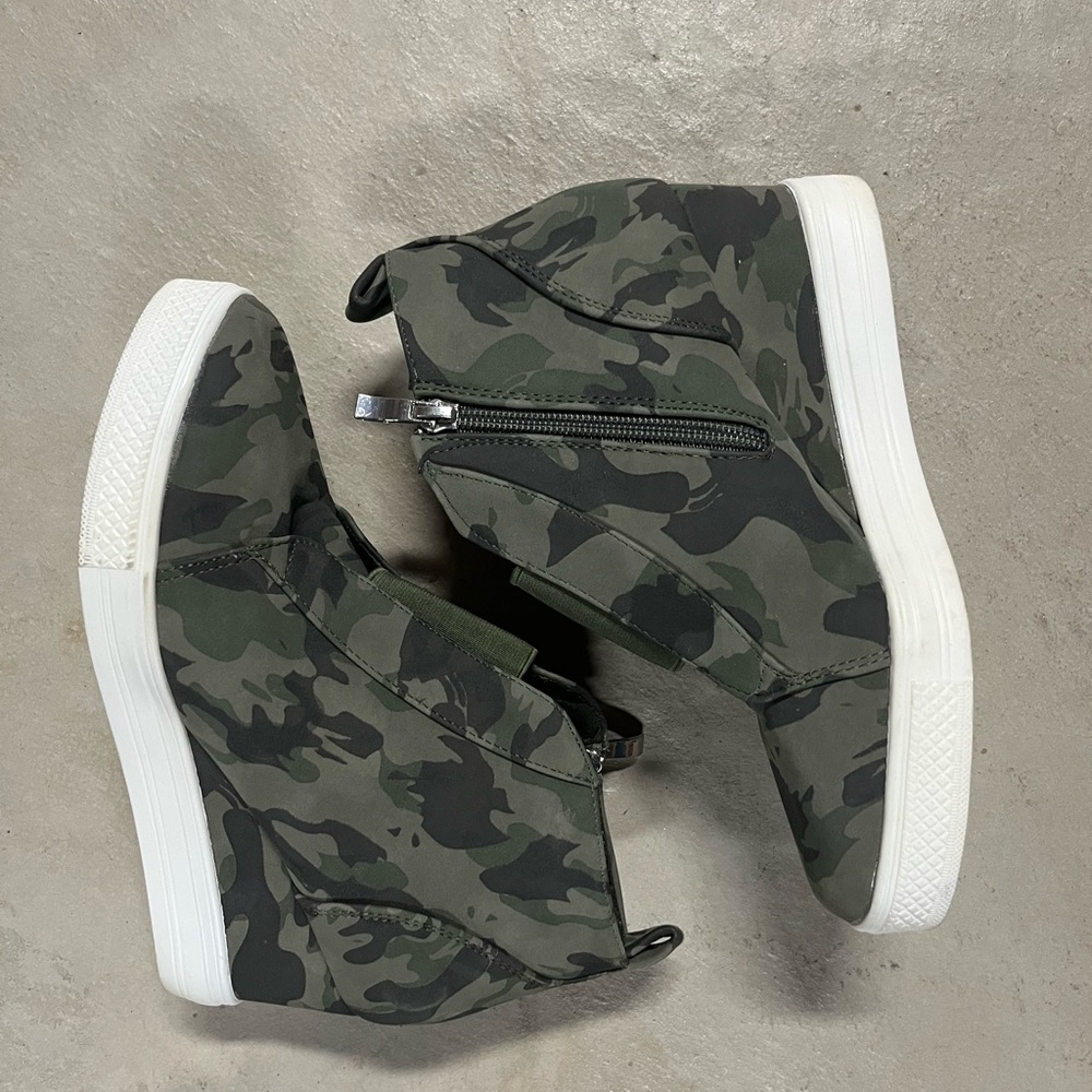 Camo wedge sneakers.